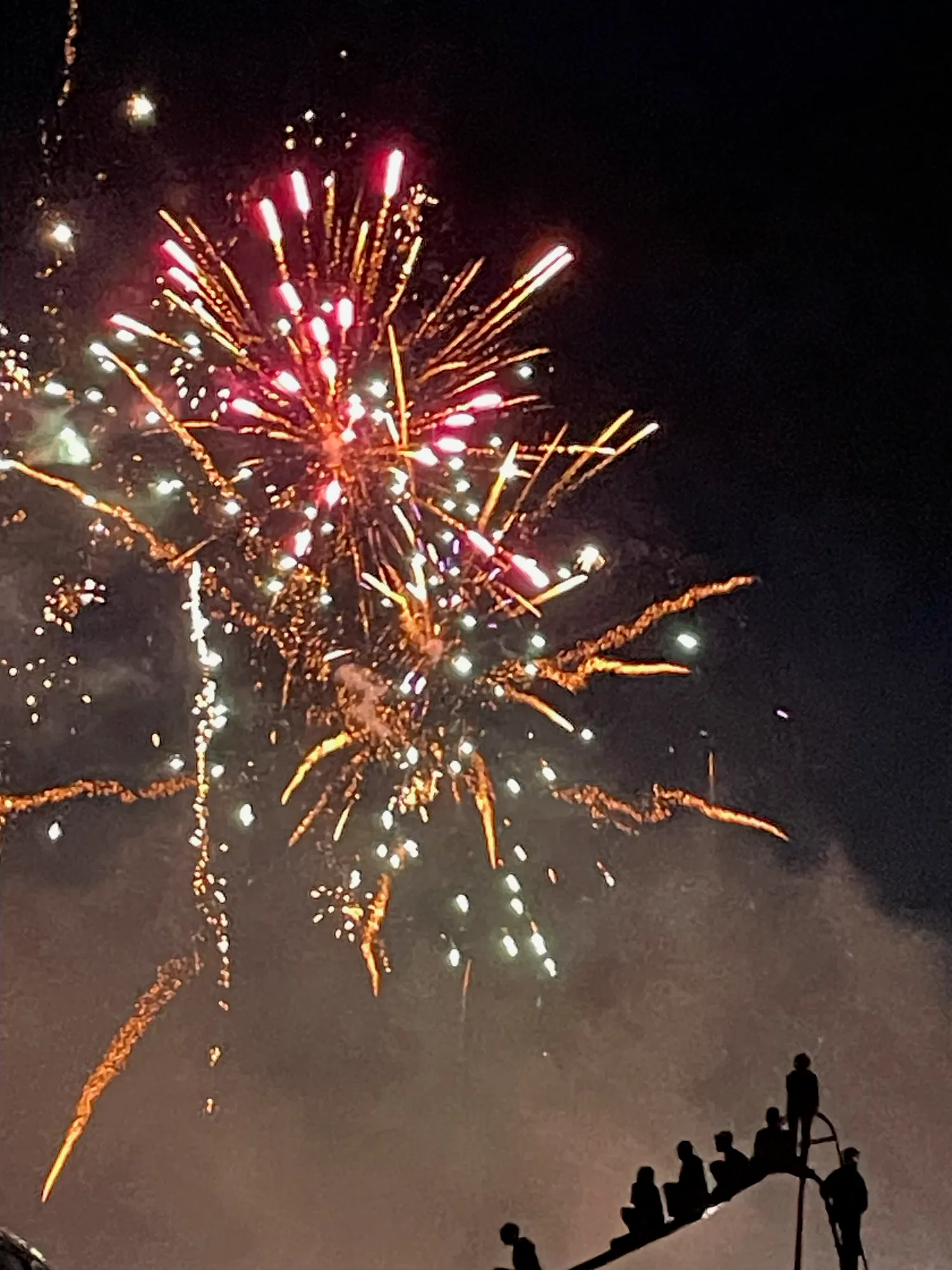 Fireworks lighting up the night sky over the campground