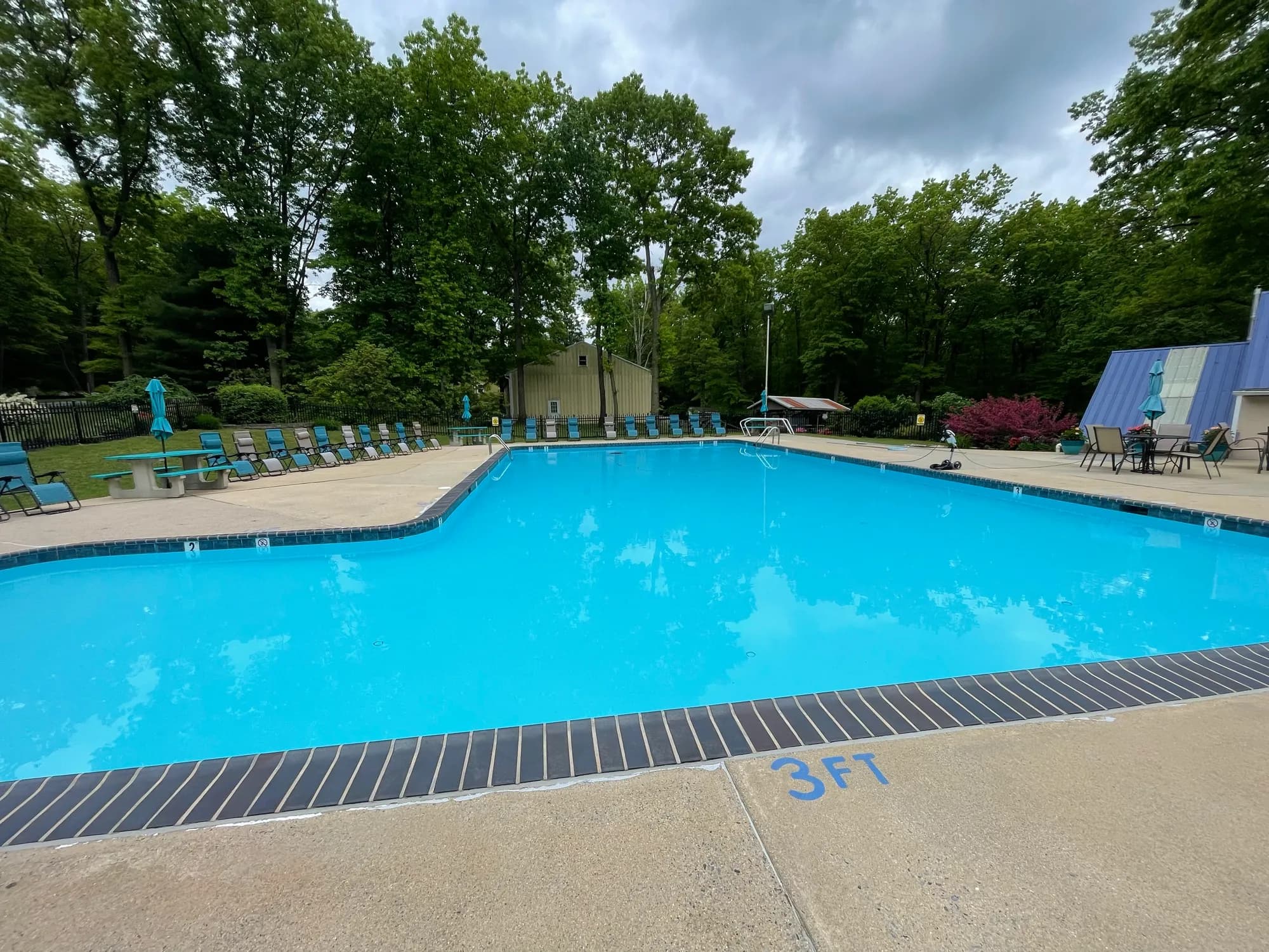 Wide view of the swimming pool and sun deck